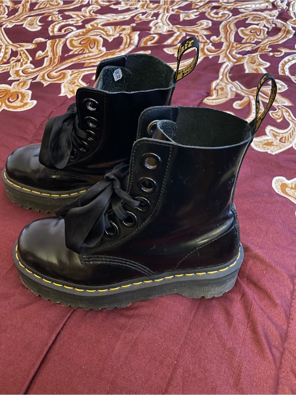 Dr. Martens Black Patent Combat Boots with Yellow Stitching